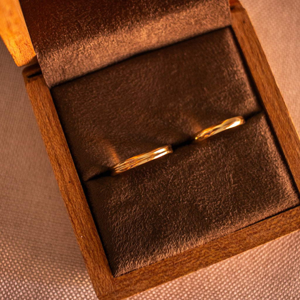Par de alianças "Nós" em Ouro18k